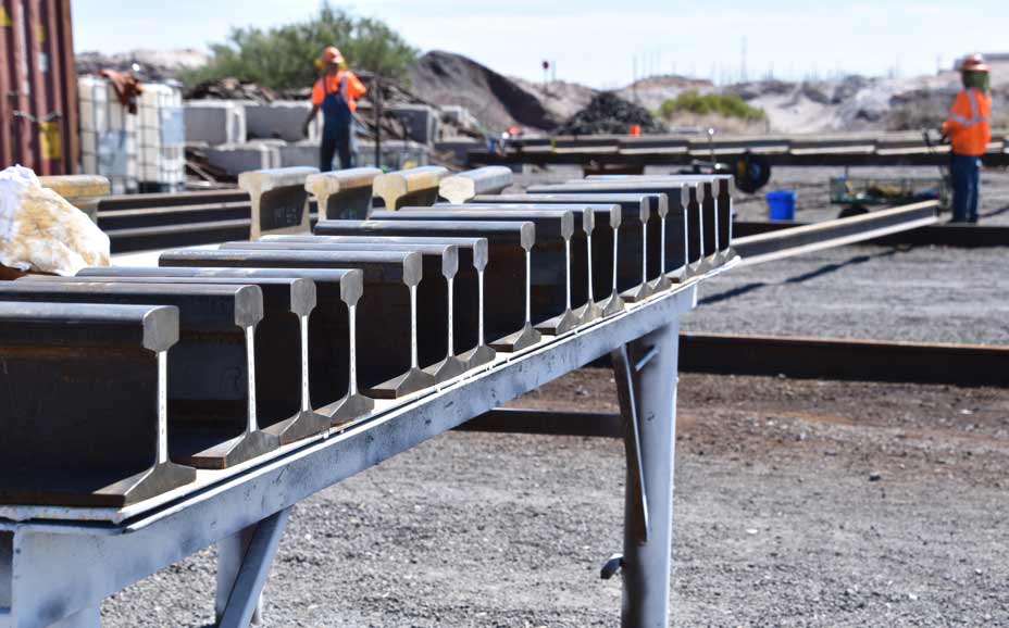 RCL Track Services crew are sorting and inspecting unloaded track materials.